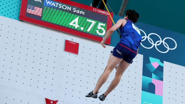 PARIS, FRANCE - AUGUST 06: Sam Watson of Team United States celebrates after setting a new world record of 4.75 seconds during the Men's Speed, Qualification Seeding on day eleven of the Olympic Games Paris 2024 at Le Bourget Sport Climbing Venue on August 06, 2024 in Paris, France. (Photo by Al Bello/Getty Images)