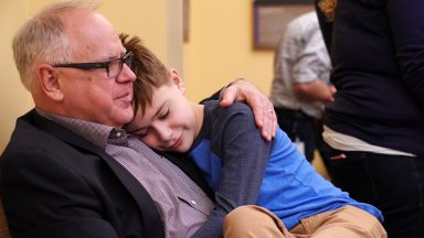 ST. PAUL, MN. - JANUARY 2019: Minnesota DFL(Democratic-Farmer-Labor Party) Governor-elect Tim Walz gave a hug to his son Gus during a birthday party for his daughter Hope, Sunday, January 6, 2019 at the State Capitol in St. Paul, Minn. (Photo by Anthony Souffle/Star Tribune via Getty Images)