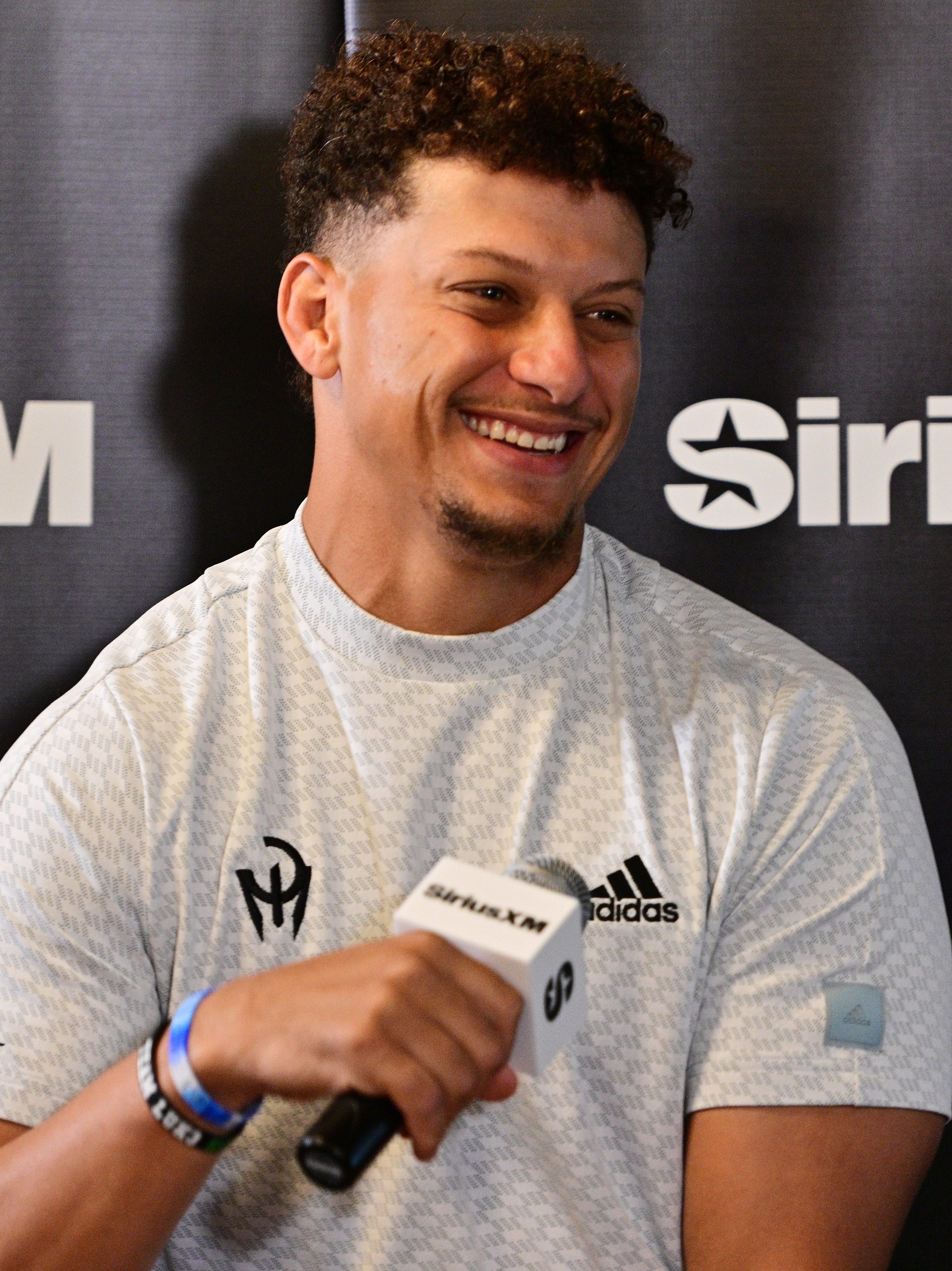 ST JOSEPH, MISSOURI - AUGUST 13: Patrick Mahomes participates in Sirius XM's  NFL Radio Town Hall with Andy Reid and the Kansas City Chiefs at Missouri Western State University on August 13, 2024 in St Joseph, Missouri. (Photo by Fernando Leon/Getty Images for SiriusXM)