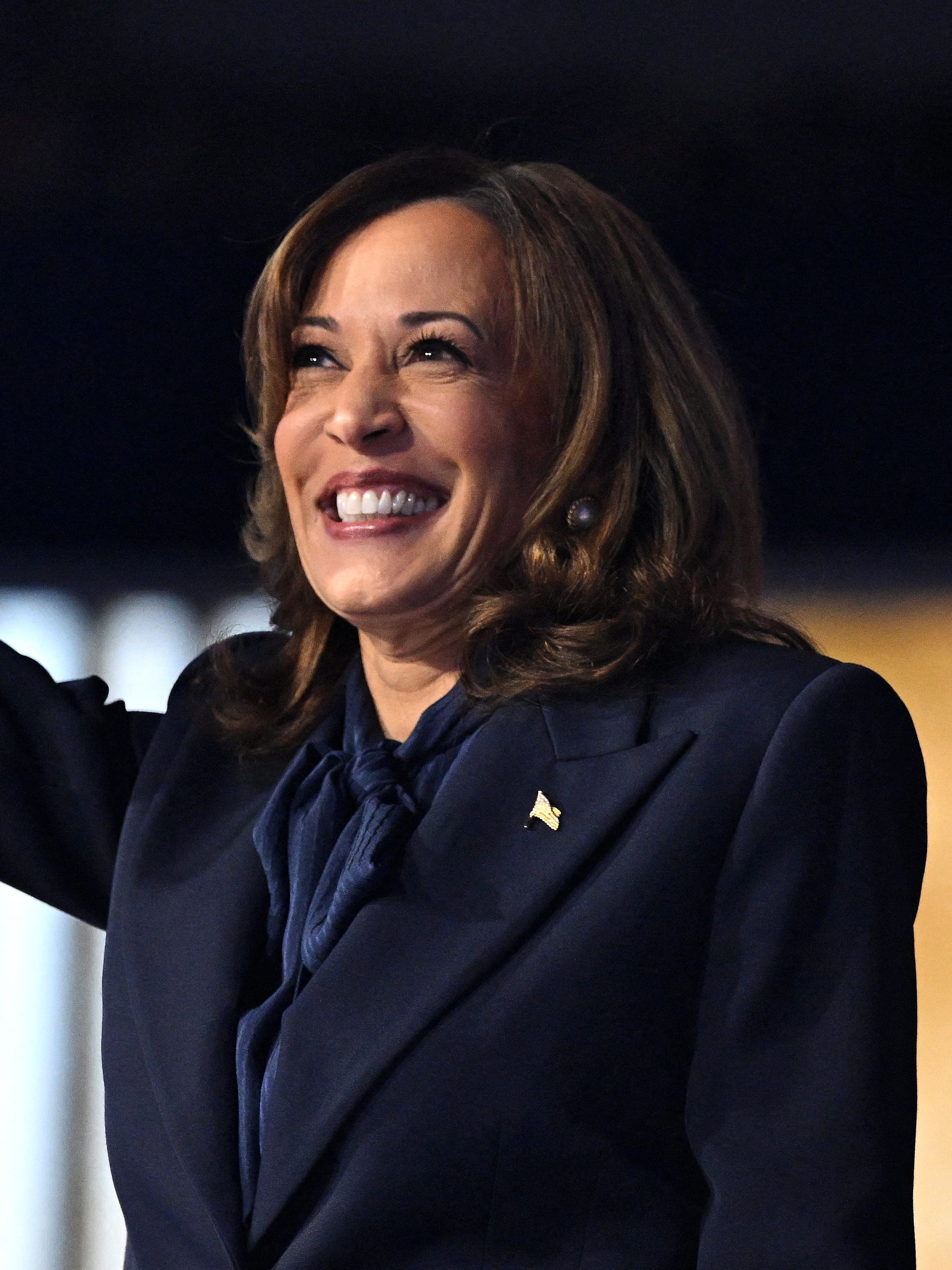 Kamala Harris waves after speaking on the fourth and last day of the Democratic National Convention