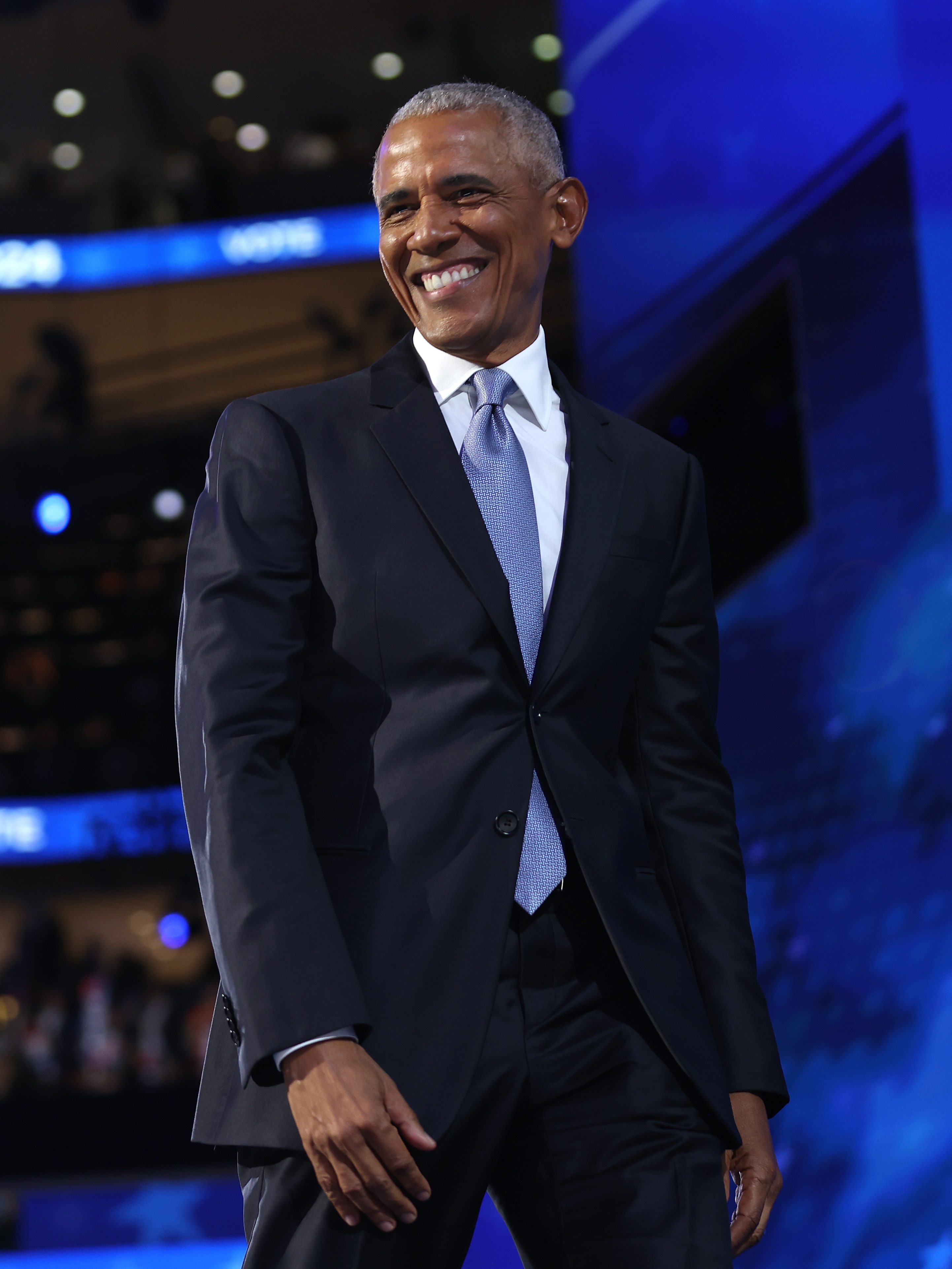 CHICAGO, ILLINOIS - AUGUST 20: Former U.S. President Barack Obama departs after speaking on stage during the second day of the Democratic National Convention at the United Center on August 20, 2024 in Chicago, Illinois. Delegates, politicians, and Democratic Party supporters are gathering in Chicago, as current Vice President Kamala Harris is named her party's presidential nominee. The DNC takes place from August 19-22. (Photo by Justin Sullivan/Getty Images)