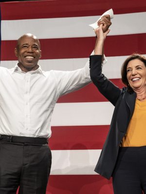 NEW YORK, USA - NOVEMBER 05:  Mayor Eric Adams and Kathy Hochul on stage during election campaign rally for Governor Kathy Hochul organized by New York State Democratic Committee at BKLYN Studios in New York on November 5, 2022. Rally featured Attorney General Letitia James, State Comptroller Tom DiNapoli, Senate Majority Leader Chuck Schumer, Representative Hakeem Jeffries, New York City Mayor Eric Adams and actress Rosie Perez. (Photo by Lev Radin/Anadolu Agency via Getty Images)