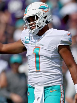 BALTIMORE, MARYLAND - SEPTEMBER 18: Tua Tagovailoa #1 of the Miami Dolphins celebrates a touchdown in the second quarter against the Baltimore Ravens at M&T Bank Stadium on September 18, 2022 in Baltimore, Maryland. (Photo by Patrick Smith/Getty Images)