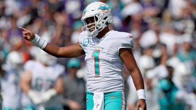 BALTIMORE, MARYLAND - SEPTEMBER 18: Tua Tagovailoa #1 of the Miami Dolphins celebrates a touchdown in the second quarter against the Baltimore Ravens at M&T Bank Stadium on September 18, 2022 in Baltimore, Maryland. (Photo by Patrick Smith/Getty Images)