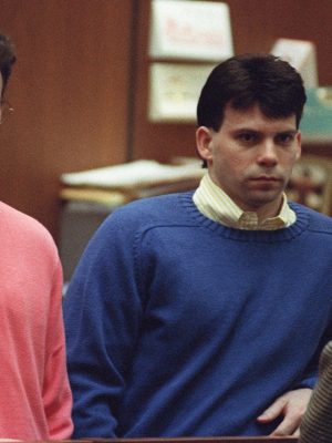 Erik Menendez (L) and his brother Lyle (R) listen during a pre-trial hearing, on December 29, 1992 in Los Angeles after the two pleaded innocent in the August 1989 shotgun deaths of their wealthy parents, Jose and Mary Louise Menendez of Beverly Hills, Calif. It took 40 months for the Superior Court arraignment after prosecutors and defense attorneys battled over the admissibility of taped confessions the brothers allegedly made to their psychotherapist. AFP PHOTO VINCE BUCCI (Photo by VINCE BUCCI / AFP) (Photo by VINCE BUCCI/AFP via Getty Images)