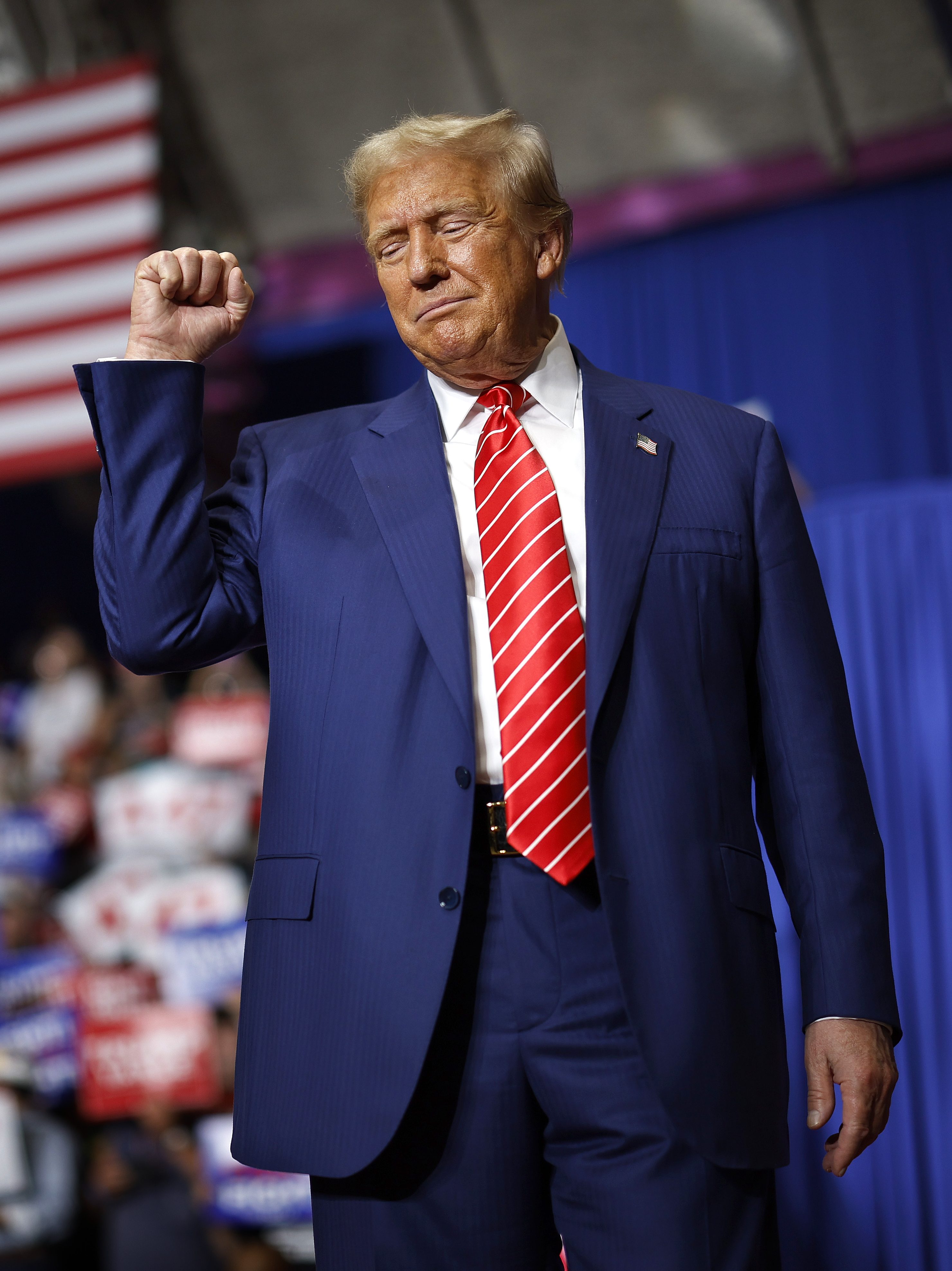 JOHNSTOWN, PENNSYLVANIA - AUGUST 30: Republican presidential nominee, former U.S. President Donald Trump takes the stage during a campaign rally in the 1st Summit Arena at the Cambria County War Memorial on August 30, 2024 in Johnstown, Pennsylvania. Promising to cut energy bills in half, conducting the largest deportation operation in history and putting a 200% tariff on foreign made automobiles, Trump called his election opponents "Comrade Kamala," and "Tampon Tim" while rallying in the all-important battleground state of Pennsylvania. (Photo by Chip Somodevilla/Getty Images)