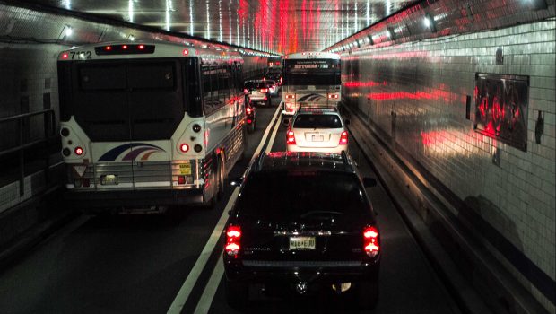 WEEHAWKEN, NEW JERSEY - NOVEMBER 10: Bus passengers on board a Megabus coach service are caught in traffic November 10, 2014 in the Lincoln Tunnel in Weehawken, New Jersey. (Photo by Robert Nickelsberg/Getty Images)
