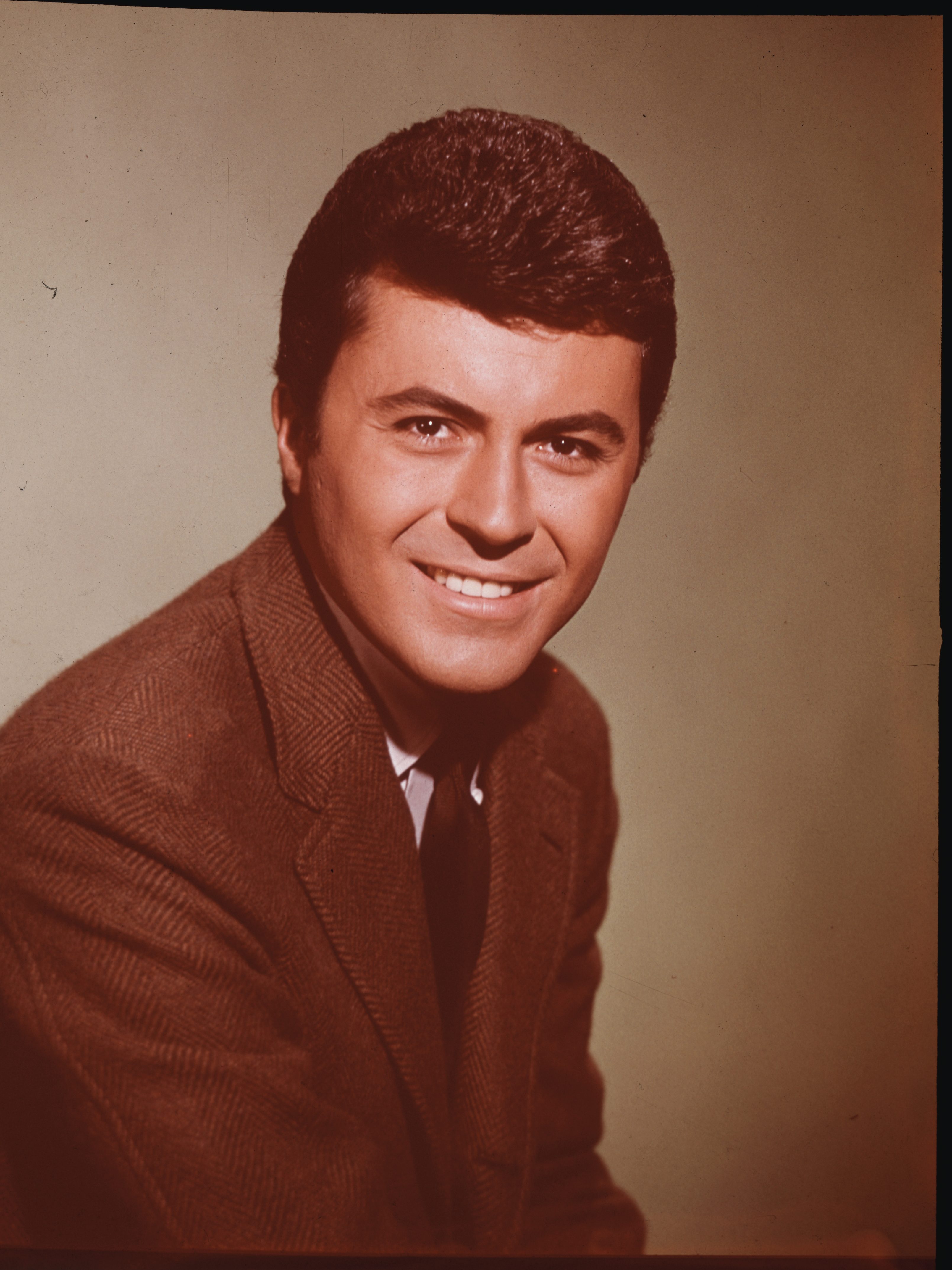 (Original Caption) Head and shoulders photo of actor James Darren smiling. Ca. 1960s.