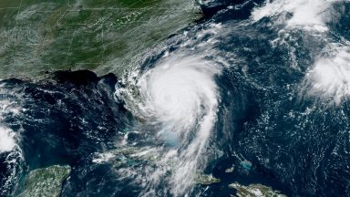 Hurricane Dorian, now a Cat. 2 storm, inches northwest away from the Bahamas on September 3, 2019 in the Atlantic Ocean. Dorian moved slowly past the Bahamas at times just 1 mph as it unleashed massive flooding and winds of 150 m.p.h. (Photo by NOAA via Getty Images)