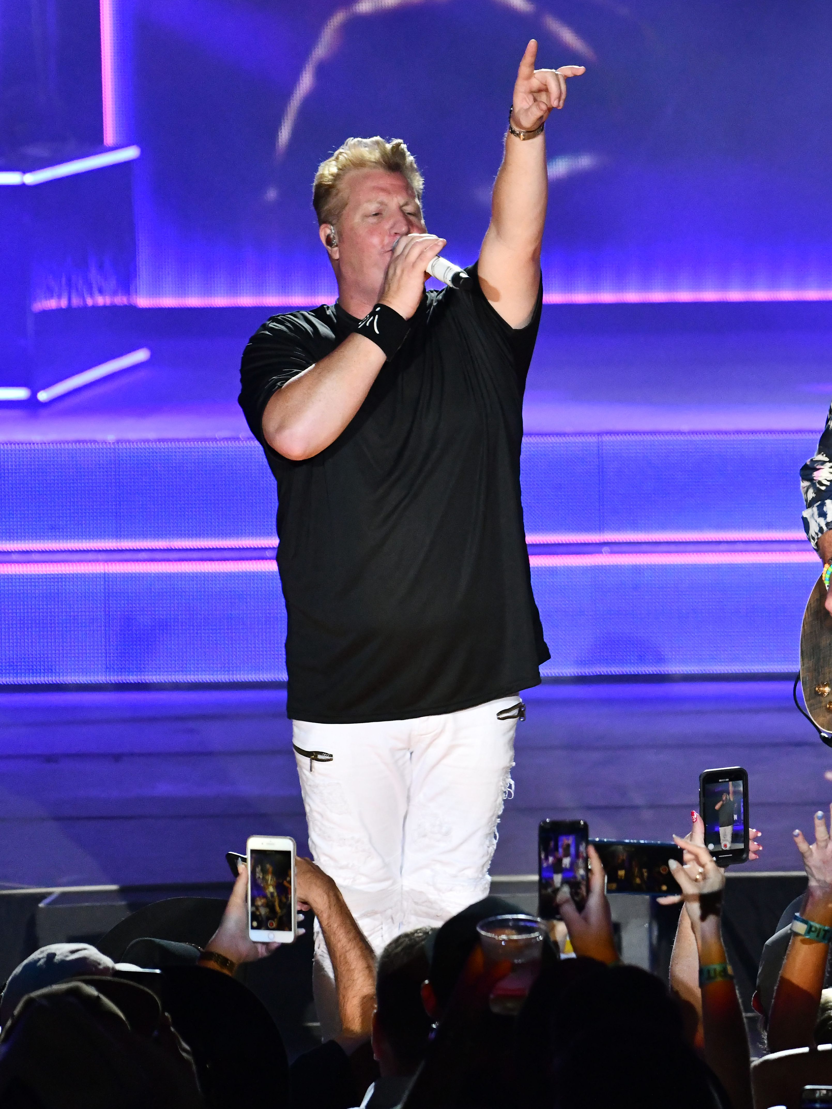 IRVINE, CALIFORNIA - AUGUST 01: (L-R) Singers Gary LeBox, Joe Don Rooney, Jay DeMarcus of the band Rascal Flatts performs onstage at FivePoint Amphitheatre on August 01, 2019 in Irvine, California. (Photo by Scott Dudelson/Getty Images)