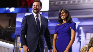 Milwaukee, Wisconsin, Wednesday, July 17, 2024 - Vice Presidential candidate J.D. Vance with his wife, Usha on stage during day three of the Republican National Convention at Fiserv Forum. (Robert Gauthier/Los Angeles Times via Getty Images)