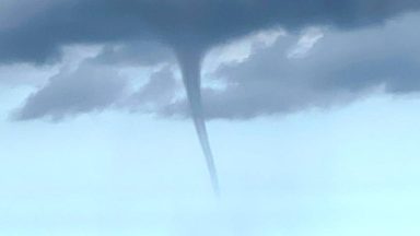 08 August 2024, Lower Saxony, Borkum: The photo taken by a fishing boat shows a suspected tornado off the North Sea island of Borkum. A suspected tornado has caused minor devastation on the beach of the North Sea island of Borkum. On Thursday, the tornado moved from the sea over a section of the west beach and on to the promenade, as can be seen in videos on the internet. Photo: Rolf Groenewold/dpa (Photo by Rolf Groenewold/picture alliance via Getty Images)