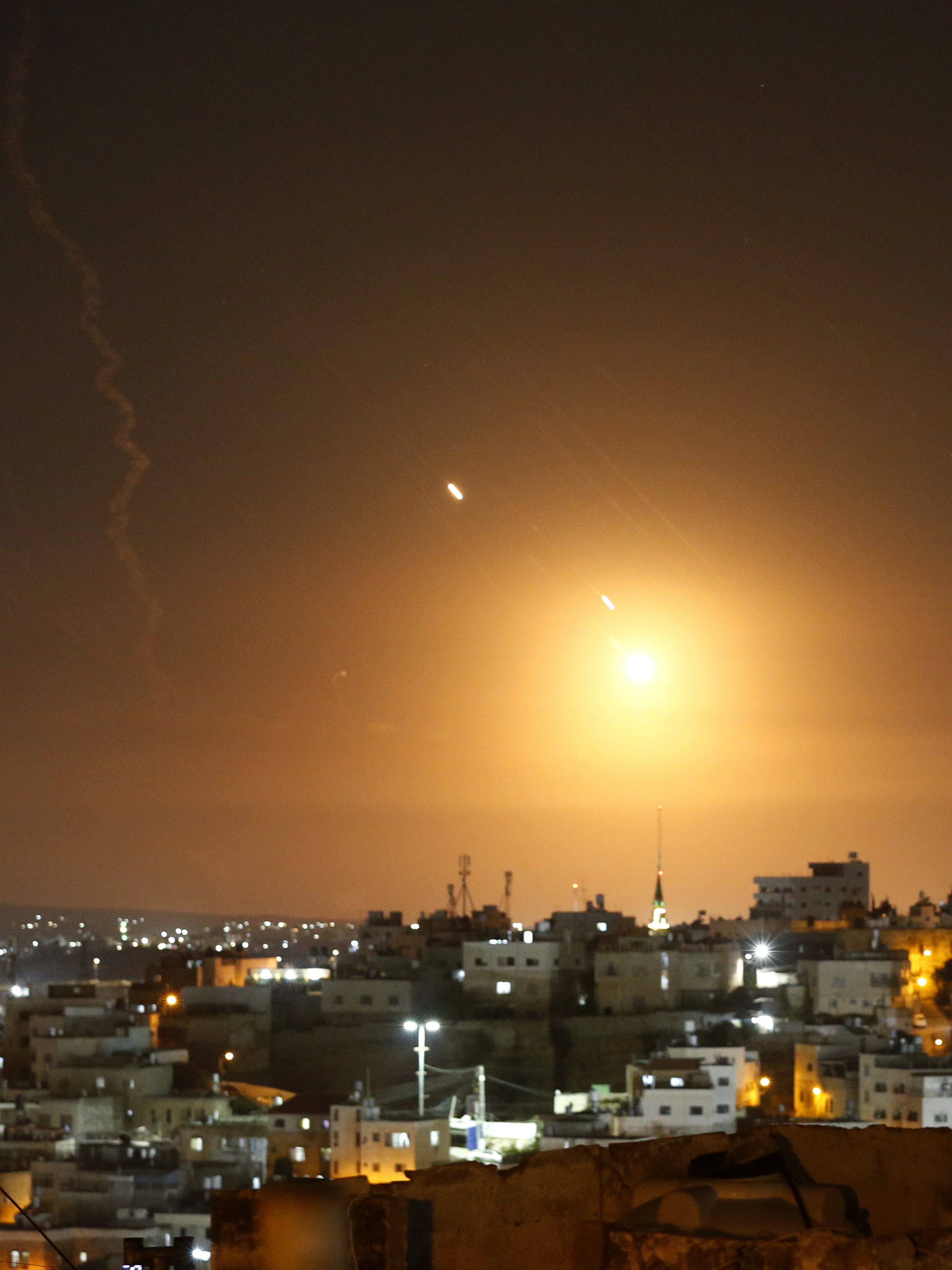 HEBRON, WEST BANK - OCTOBER 01: Many rockets, fired from Iran, are seen over Jerusalem from Hebron, West Bank on October 01, 2024. The Israeli army announced that missiles were fired from Iran towards Israel and sirens were heard across the country, especially in Tel Aviv. (Photo by Wisam Hashlamoun/Anadolu via Getty Images)