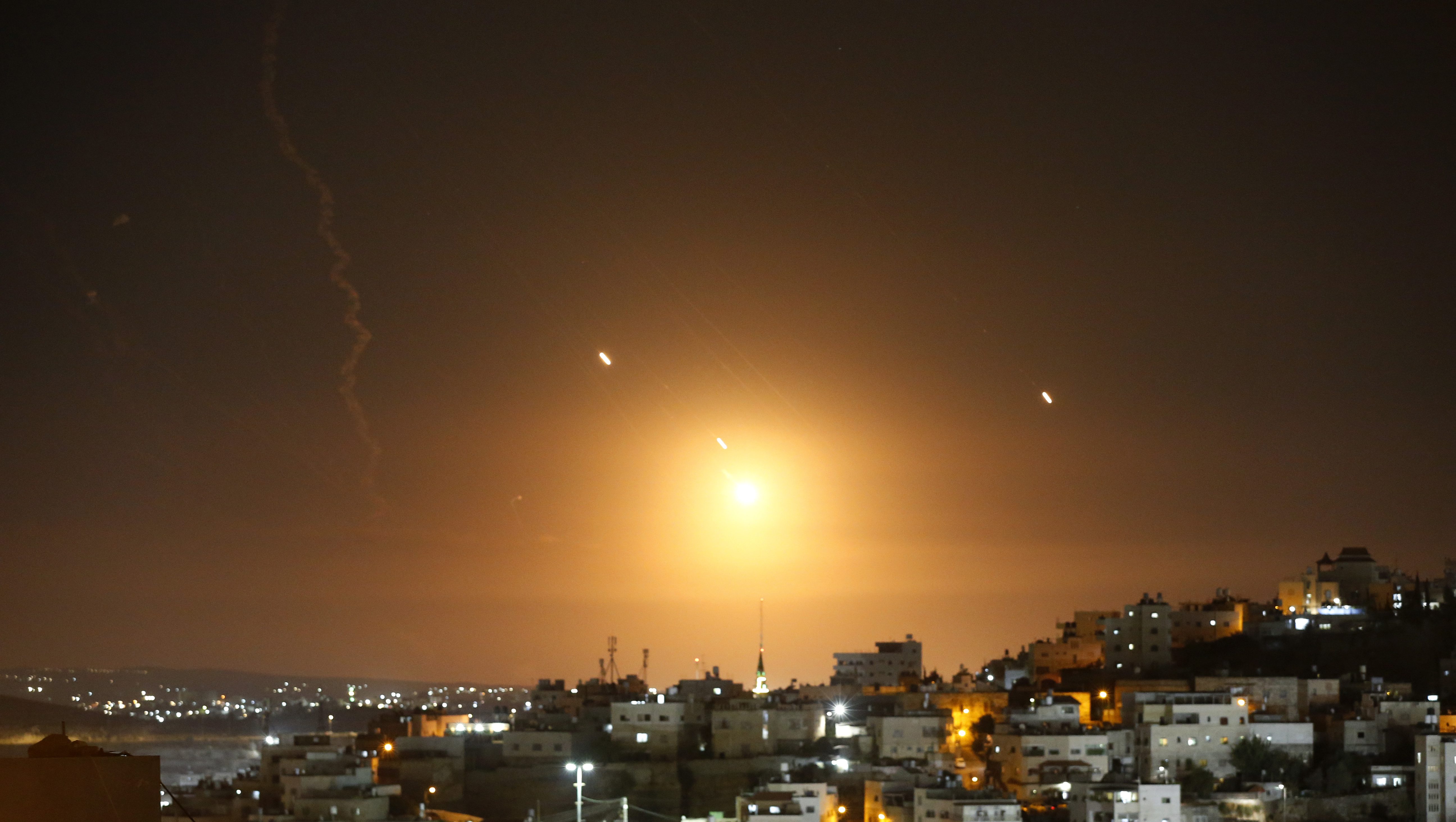 HEBRON, WEST BANK - OCTOBER 01: Many rockets, fired from Iran, are seen over Jerusalem from Hebron, West Bank on October 01, 2024. The Israeli army announced that missiles were fired from Iran towards Israel and sirens were heard across the country, especially in Tel Aviv. (Photo by Wisam Hashlamoun/Anadolu via Getty Images)