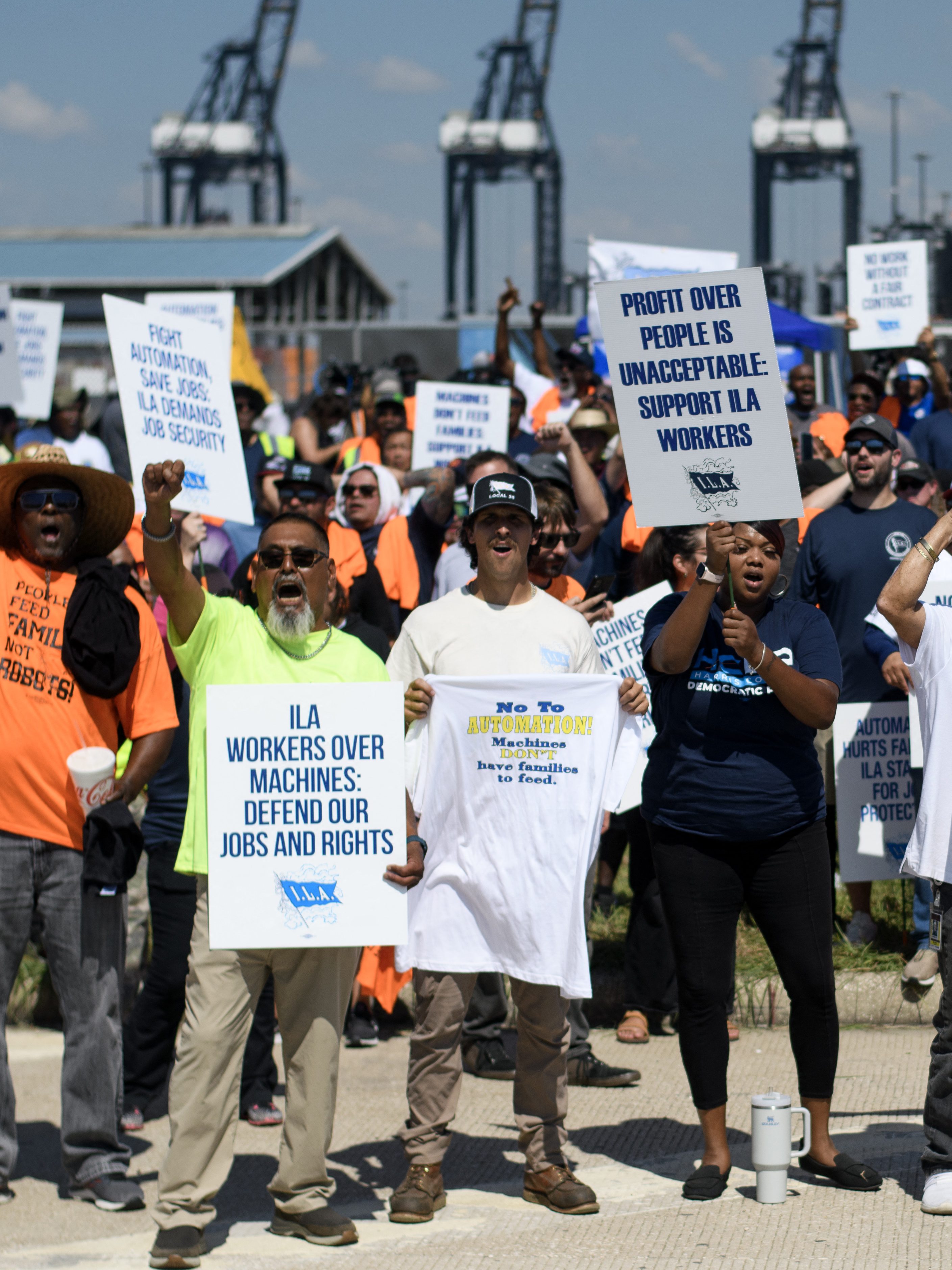 Dockworkers gather at the Bayport Container Terminal in Seabrook, Texas, on October 1, 2024. Officials at 14 ports along the US East and Gulf Coasts were making last-minute preparations on September 30 for a likely labor strike that could drag on the US economy just ahead of a presidential election -- despite last-minute talks. (Photo by Mark Felix / AFP) (Photo by MARK FELIX/AFP via Getty Images)
