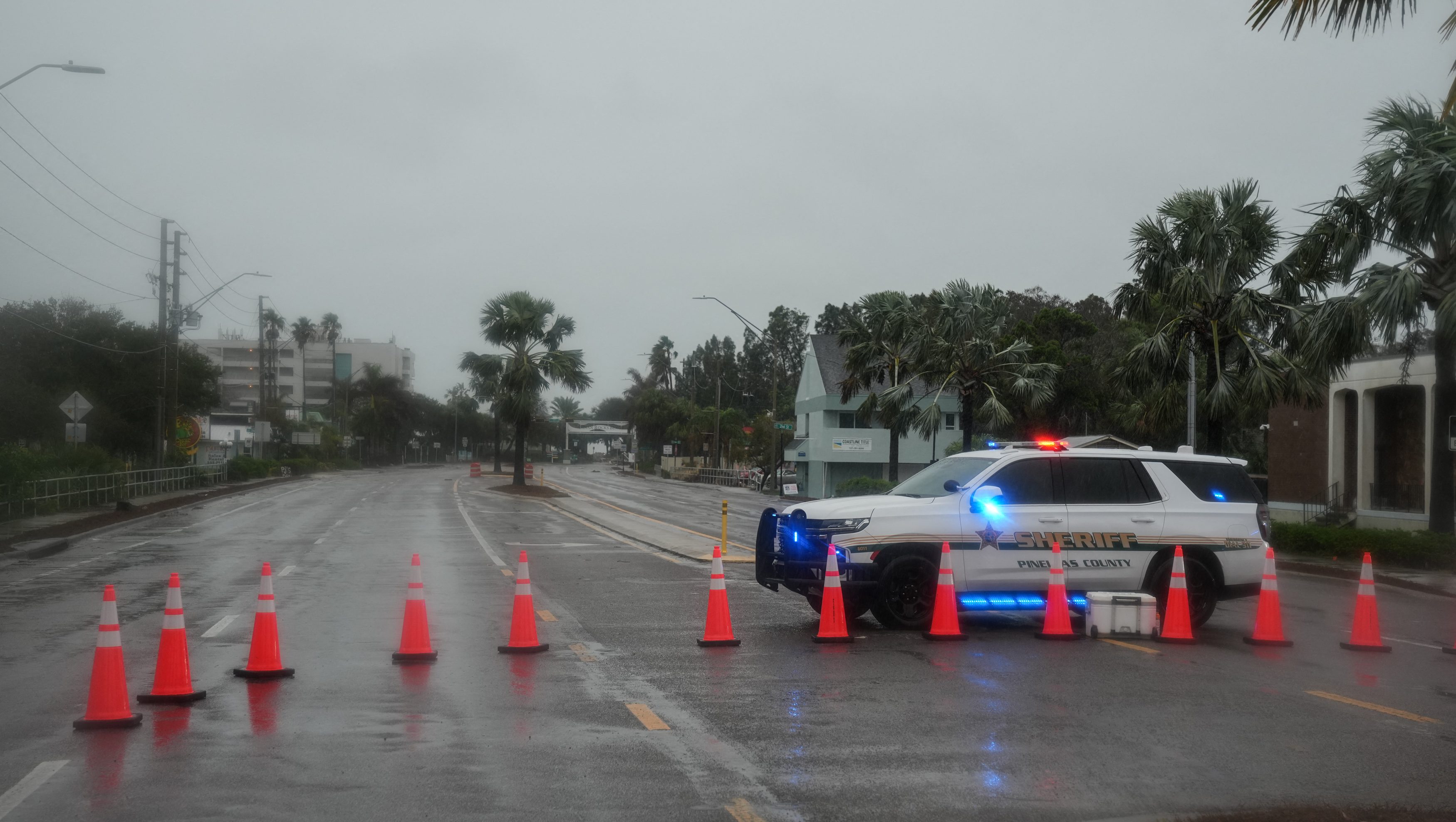 A crossing from Largo to Indian Rocks Beach on the Gulf of Mexico is closed Hurricane Milton's expected landfall tonight on October 9, 2024 in Florida. Milton regained power on October 8 to become a Category 5 storm with maximum sustained winds of 165 mph (270 kph) as it barrels towards the west-central coast of Florida and is forecast to make landfall late October 9, according to the National Hurricane Center. (Photo by Bryan R. SMITH / AFP) (Photo by BRYAN R. SMITH/AFP via Getty Images)