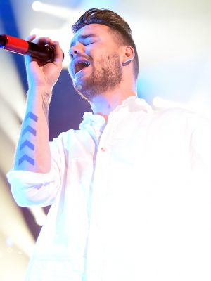LOS ANGELES, CA - DECEMBER 04:  Singer Liam Payne of One Direction performs onstage during 102.7 KIIS FMs Jingle Ball 2015 Presented by Capital One at STAPLES CENTER on December 4, 2015 in Los Angeles, California.  (Photo by Jason Merritt/Getty Images for iHeartMedia)