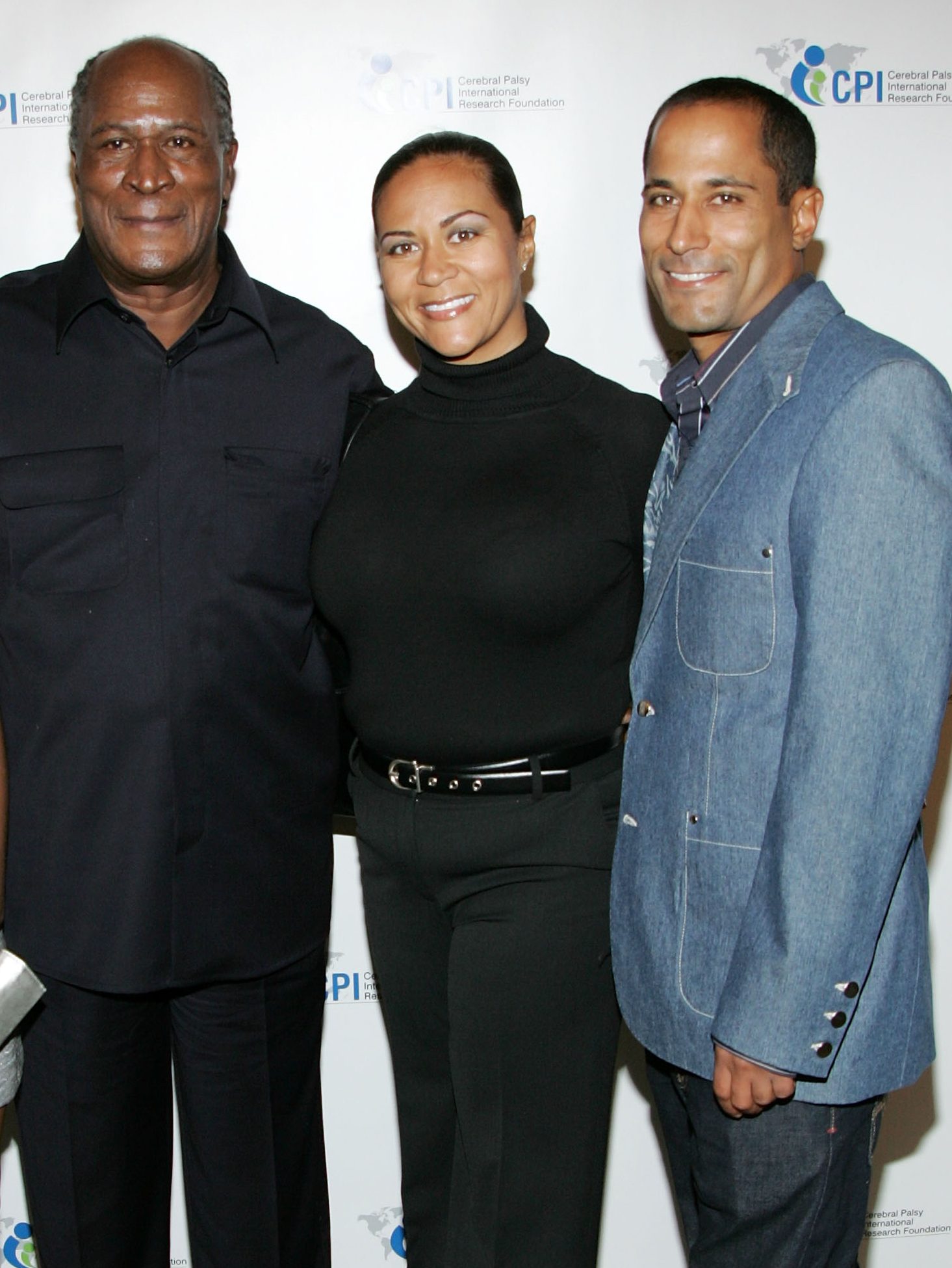 LOS ANGELES, CA - DECEMBER 03:  Granddaughter Quiera Williams, honoree actor John Amos, his daughter Shannon Amos, and son K.C. Amos arrive at the 1st Annual "A Celebration of Heroes" Power Heroes Gala at the Four Seasons Hotel on December 3, 2008 in Los Angeles, California.  (Photo by Brian To/FilmMagic)