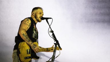 NASHVILLE, TENNESSEE - JUNE 29: Zach Bryan performs during the Quittin Time tour at Nissan Stadium on June 29, 2024 in Nashville, Tennessee. (Photo by Keith Griner/Getty Images)