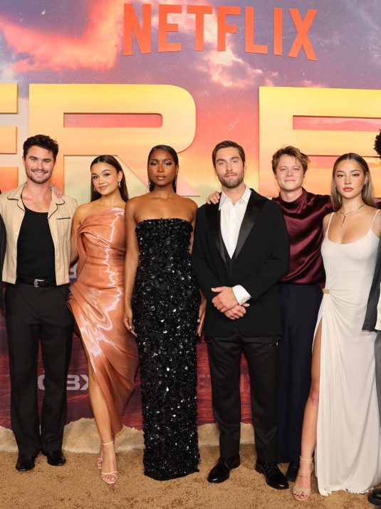 CHARLESTON, SOUTH CAROLINA - OCTOBER 08:  (L-R) Drew Starkey, Chase Stokes, Madison Bailey, Carlacia Grant, Austin North, Rudy Pankow, Madelyn Cline, and Jonathan Daviss attend the Outer Banks Season 4 Charleston World Premiere on October 08, 2024 in Charleston, South Carolina. (Photo by Jeff Hahne/Getty Images for Netflix)