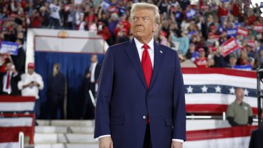 RALEIGH, NORTH CAROLINA - NOVEMBER 04: Republican presidential nominee, former U.S. President Donald Trump takes the stage during a campaign rally at the J.S. Dorton Arena on November 04, 2024 in Raleigh, North Carolina. With one day left before the general election, Trump is campaigning for re-election in the battleground states of North Carolina, Pennsylvania and Michigan. (Photo by Chip Somodevilla/Getty Images)