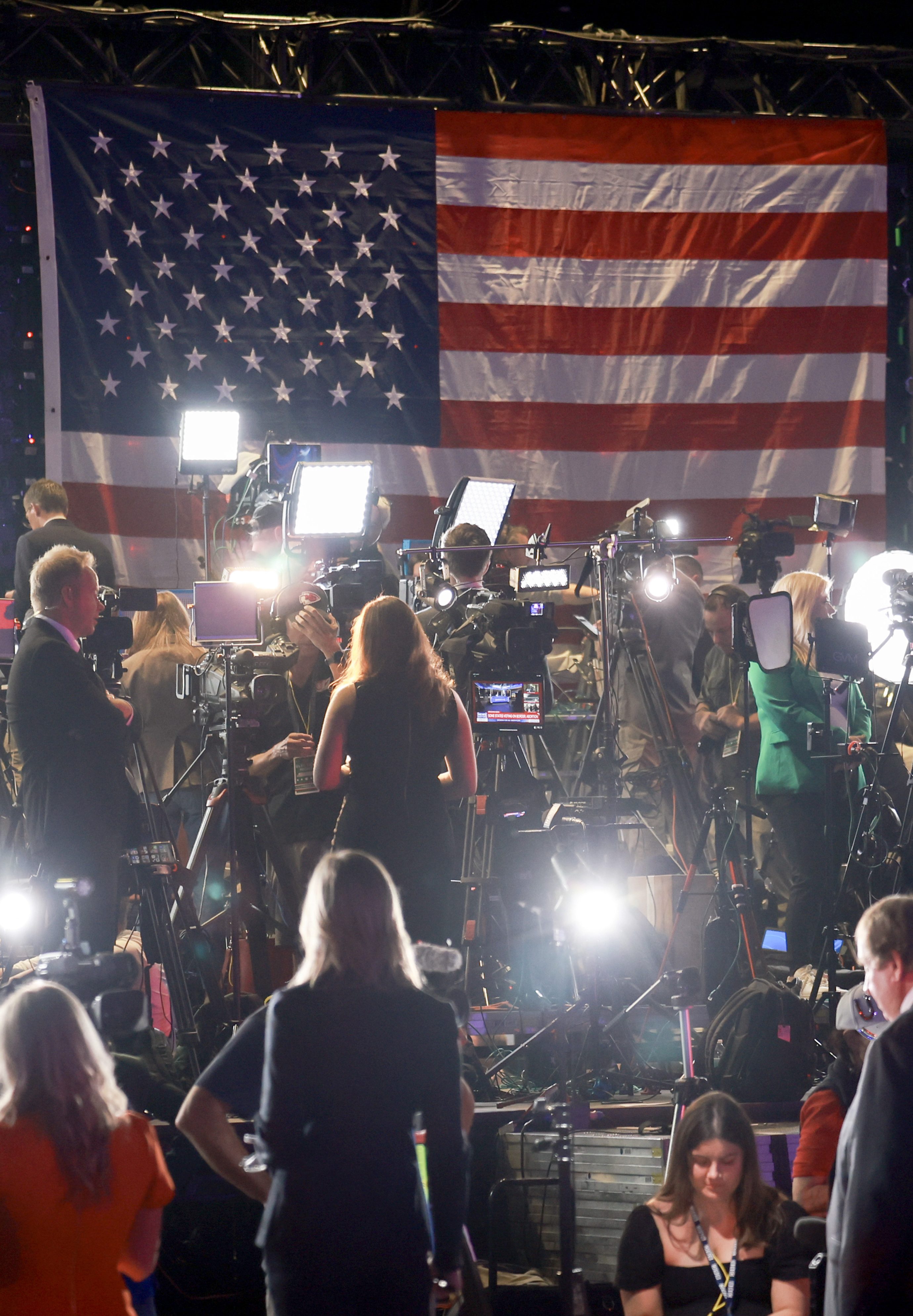 WEST PALM BEACH, FLORIDA - NOVEMBER 05: Members of the media cover the election night watch party for Republican presidential nominee former President Donald Trump at the Palm Beach County Convention Center on November 05, 2024, in West Palm Beach, Florida. Today, voters cast their ballots to determine whether Republican nominee former President Donald Trump or Democratic nominee Vice President Kamala Harris will become the next President of the United States. (Photo by Joe Raedle/Getty Images)