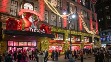 People line up outside of Macy's flagship store before opening on Black Friday, in New York City on November 29, 2024. The annual Black Friday shopping day has always been about finding the best deals, but this year retailers are preparing for a US consumer more zealously fixated than ever on getting value for their money. (Photo by Adam GRAY / AFP) (Photo by ADAM GRAY/AFP via Getty Images)