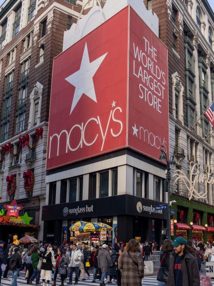 NEW YORK, NEW YORK - NOVEMBER 29: People walk past the Macy's Herald Square flagship store on November 29, 2024 in New York City. Black Friday sales will give economists a glimpse into consumers' holiday shopping mood. (Photo by David Dee Delgado/Getty Images)