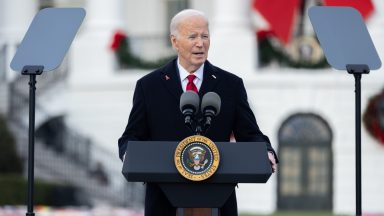 WASHINGTON, DC UNITED STATES- DECEMBER 1: President Joe Biden speaks at a ceremony on the South Lawn of the White House commemorating World AIDS Day on December 1, 2024 in Washington, DC. President Joe Biden pardoned his son, Hunter, marking a significant reversal of his previous stance. The president had long maintained that he would not use his executive authority to grant his son a pardon or commute his sentence. (Photo by Nathan Posner/Anadolu via Getty Images)