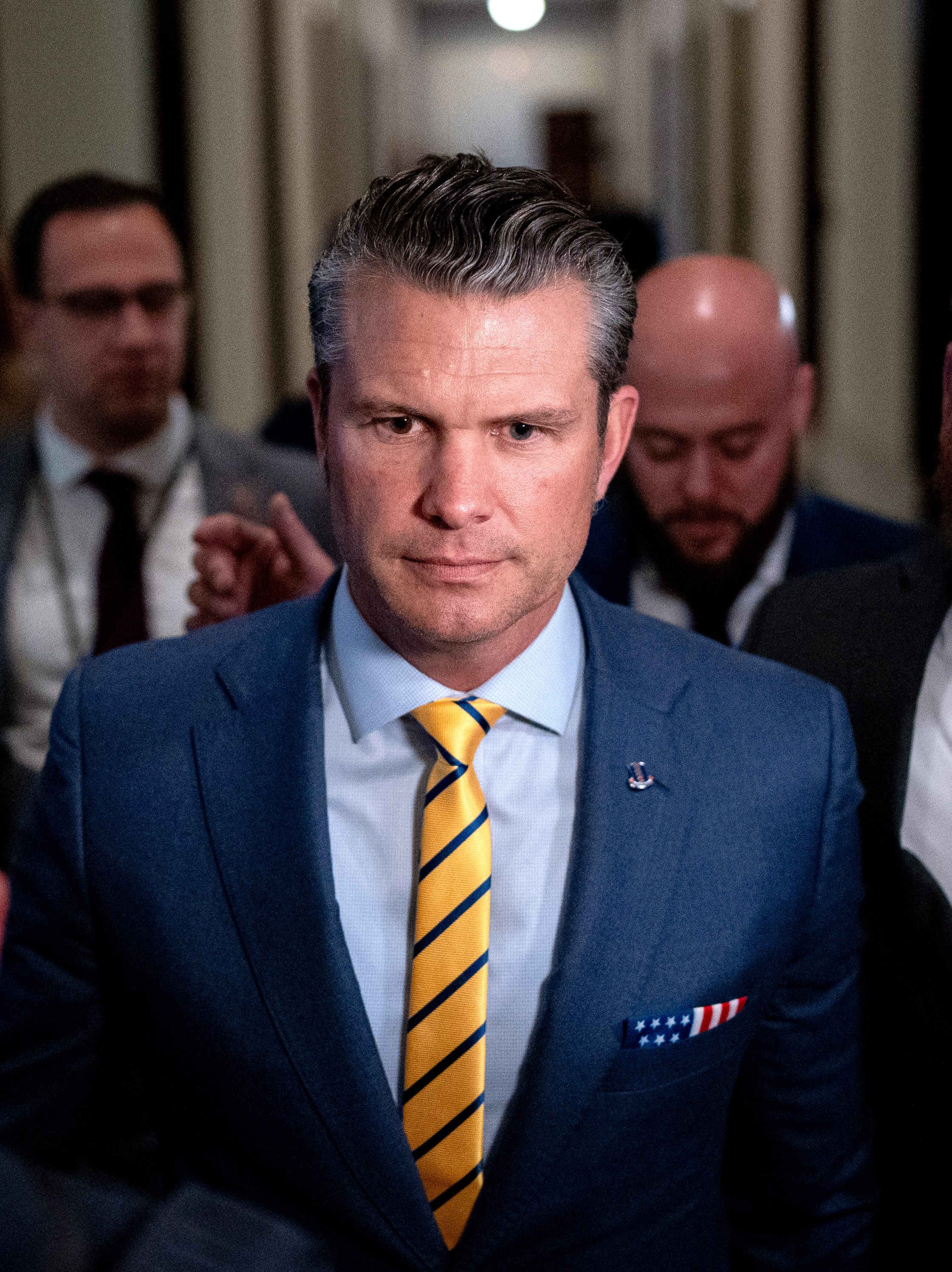 WASHINGTON, DC - DECEMBER 3: U.S. President-elect Donald Trump's nominee to be Secretary of Defense Pete Hegseth (C) walks through the Russell Senate Office Building on Capitol Hill on December 3, 2024 in Washington, DC. Hegseth continues to meet with Senate Republicans on Capitol Hill as new allegations of alcohol abuse and sexual misconduct have emerged. (Photo by Andrew Harnik/Getty Images)