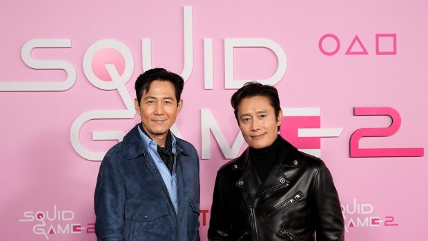 LOS ANGELES, CALIFORNIA - DECEMBER 12: (L-R) Lee Jung-jae and Lee Byung-hun attend the Los Angeles Premiere & Fan Event for Netflix's "Squid Game" Season 2 at Los Angeles City College on December 12, 2024 in Los Angeles, California.  (Photo by Presley Ann/Getty Images for Netflix)