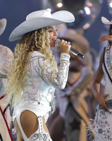 HOUSTON, TEXAS - DECEMBER 25: Beyoncé performs with daughter, Blue Ivy, during the halftime show for the game between the Baltimore Ravens and the Houston Texans at NRG Stadium on December 25, 2024 in Houston, Texas. (Photo by Alex Slitz/Getty Images)