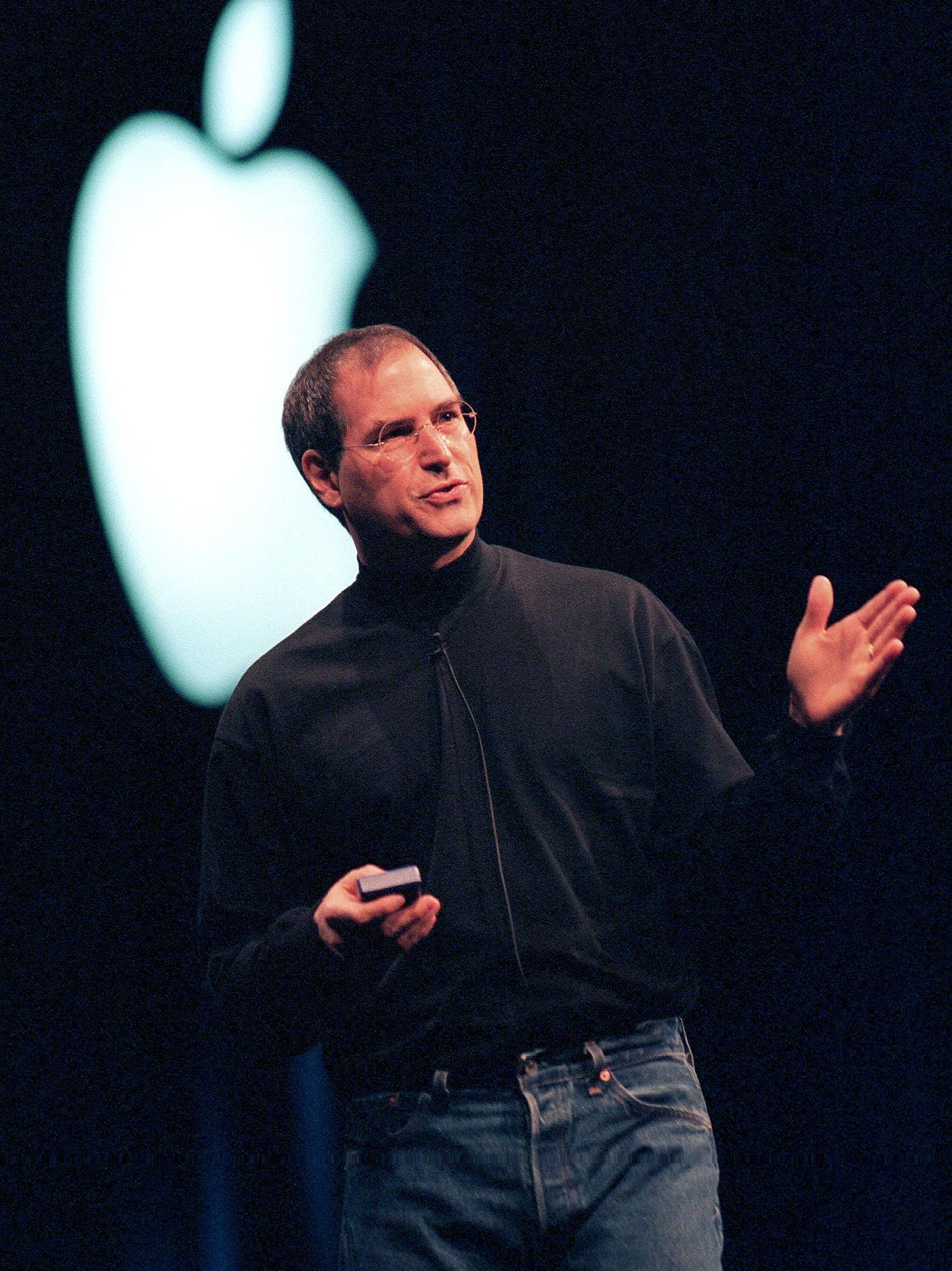 SAN FRANCISCO, UNITED STATES:  Steve Jobs, Apple new CEO and co-founder, announces that he is no longer an interim CEO of Apple, but its permanent CEO, during his keynote address at the MacWorld Expo in San Francisco 05 January, 2000. Jobs is also the CEO for his animation company, Pixar. AFP PHOTO/John G. MABANGLO (Photo credit should read JOHN G. MABANGLO/AFP via Getty Images)