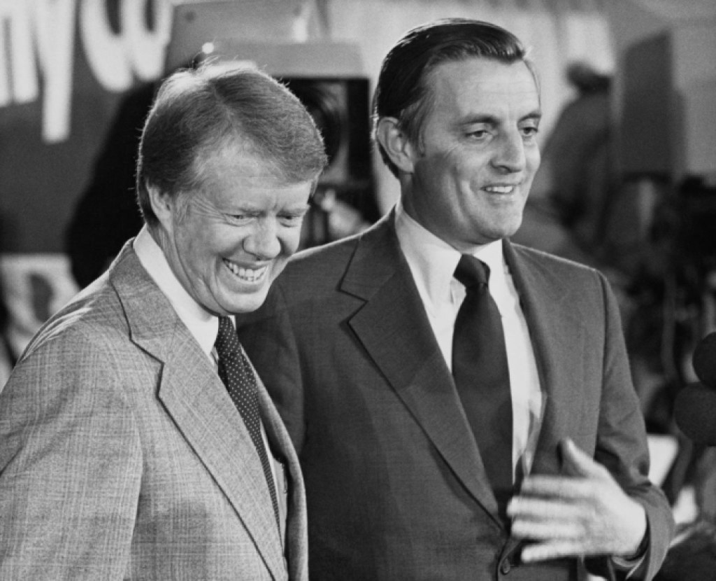 American politician and President-elect Jimmy Carter and American politician and Vice President-elect Walter Mondale (1928-2021) all smiles as they attend a post-election press conference in Plains, Georgia, 4th November 1976. Carter and Mondale are to address a nationwide television and radio audience following their victory in the 1976 United States presidential election. (Photo by Pictorial Parade/Archive Photos/Getty Images)