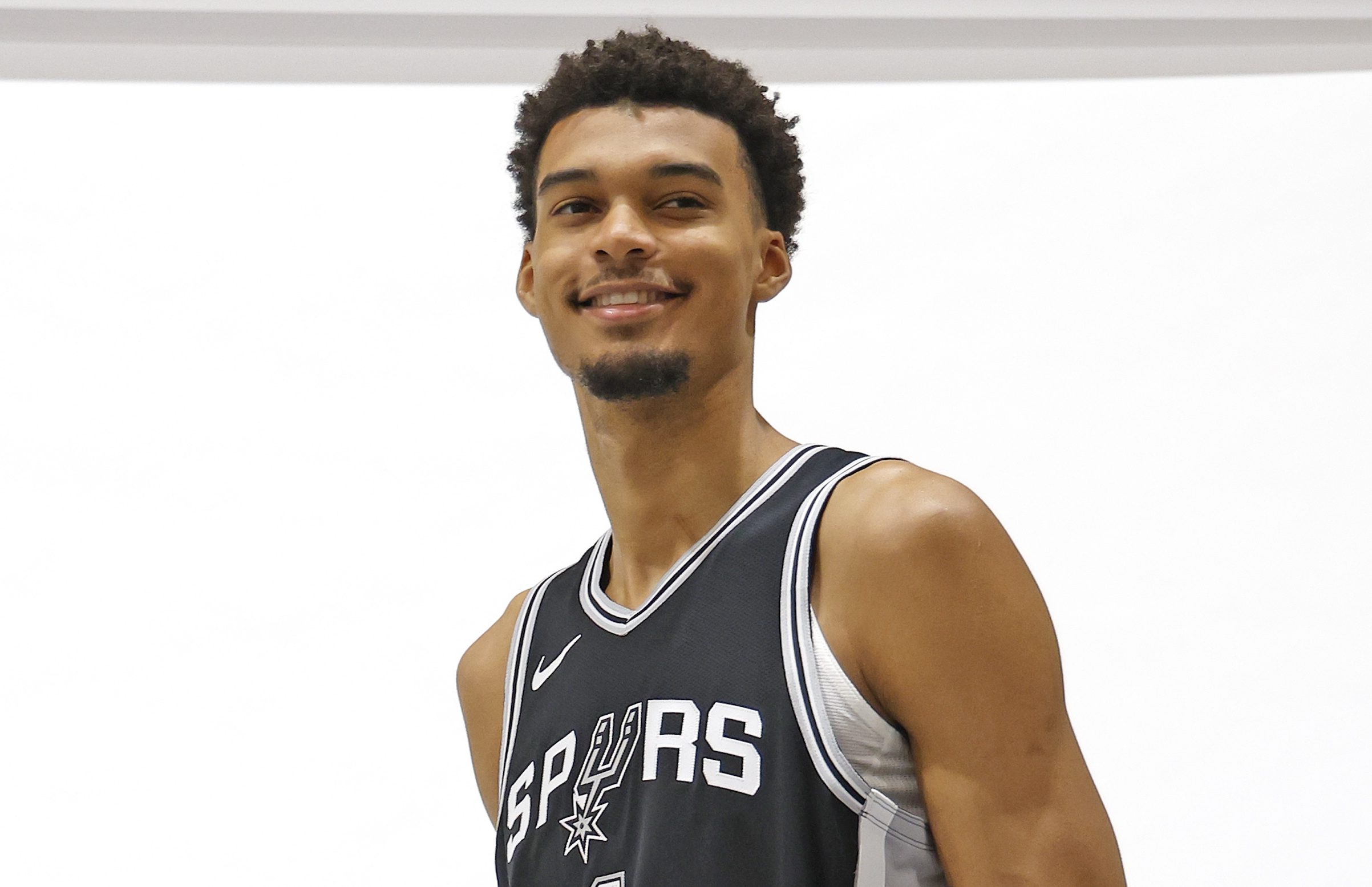 SAN ANTONIO, TX - SEPTEMBER 30: Victor Wembanyama #1 of the San Antonio Spurs poses at San Antonio Spurs Media Day at the Victory Capital Performance Center on September 30, 2024 in San Antonio, Texas. NOTE TO USER: User expressly acknowledges and agrees that, by downloading and or using this photograph, User is consenting to terms and conditions of the Getty Images License Agreement. (Photo by Ronald Cortes/Getty Images)