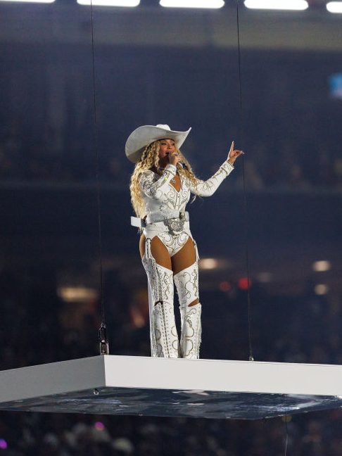 HOUSTON, TEXAS - DECEMBER 25: Beyoncé performs at halftime during an NFL football game between the Baltimore Ravens and the Houston Texans, at NRG Stadium on December 25, 2024 in Houston, Texas. (Photo by Brooke Sutton/Getty Images)
