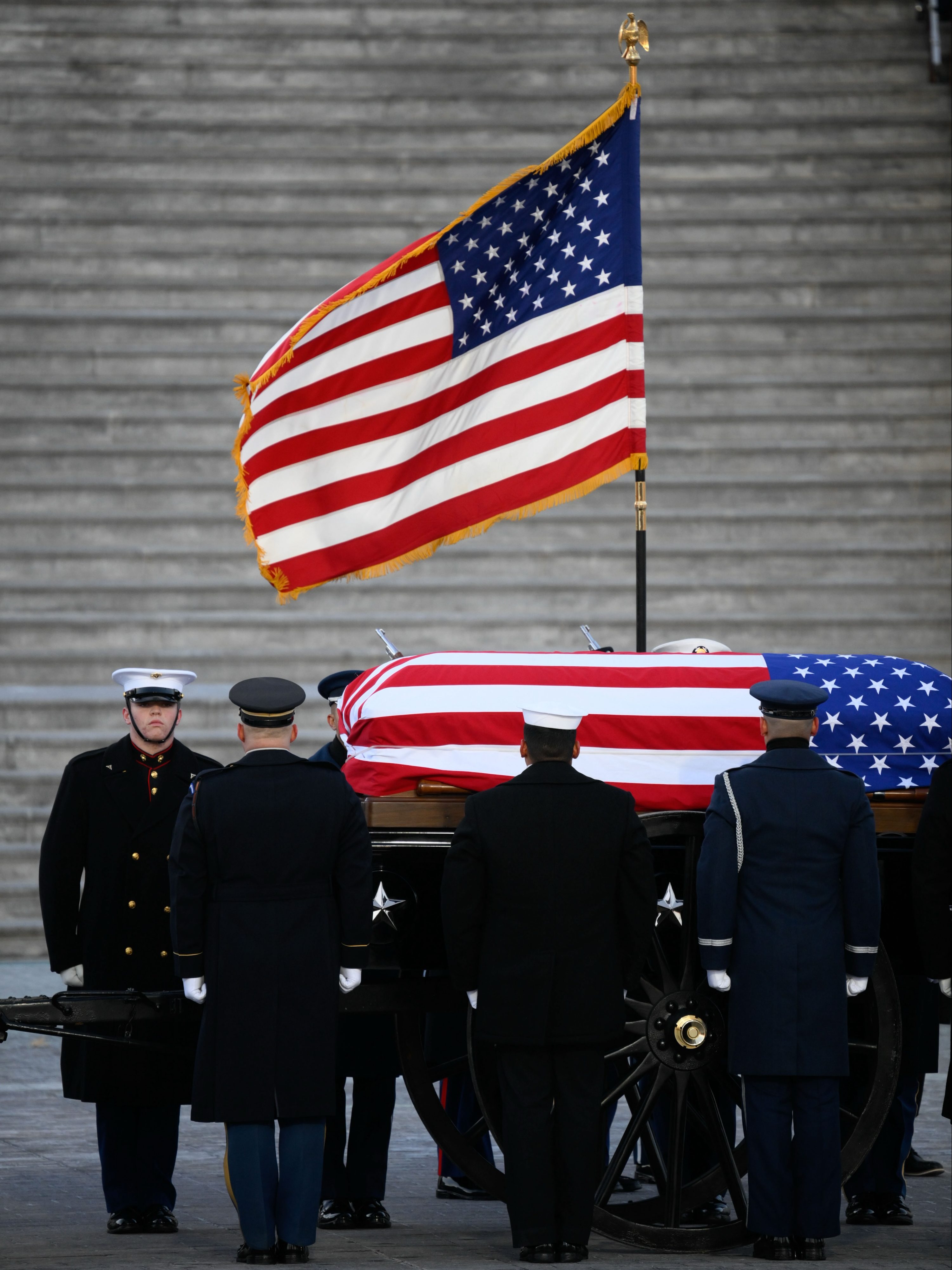 WASHINGTON, DC - JANUARY 7: The casket of former President Jimmy Carter arrives on a horse-drawn caisson to lie in state at the U.S. Capitol on January 7, 2025 in Washington, DC. (Photo by Pete Kiehart for The Washington Post via Getty Images)