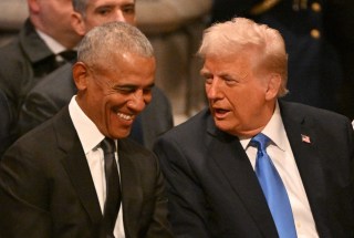 Former US President Barack Obama speaks with President-elect Donald Trump before the State Funeral Service for former US President Jimmy Carter at the Washington National Cathedral in Washington, DC, on January 9, 2025. (Photo by ROBERTO SCHMIDT / AFP)